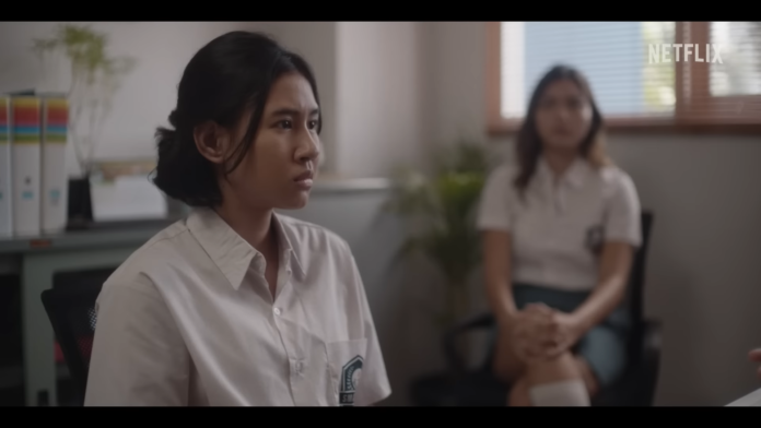 Shenina Cinnamon and Caitlin North Lewis as Laras and Dilla in a still from 'Dear David' movie on Netflix.