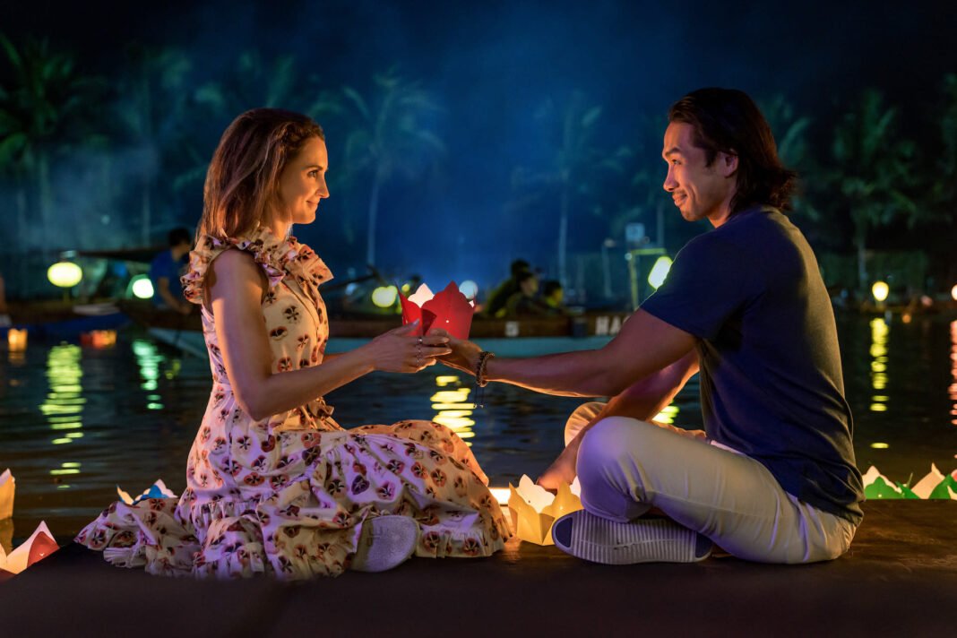 Rachel Leigh Cook and Scott Ly in a still from 'A Tourist's Guide to Love' on Netflix.